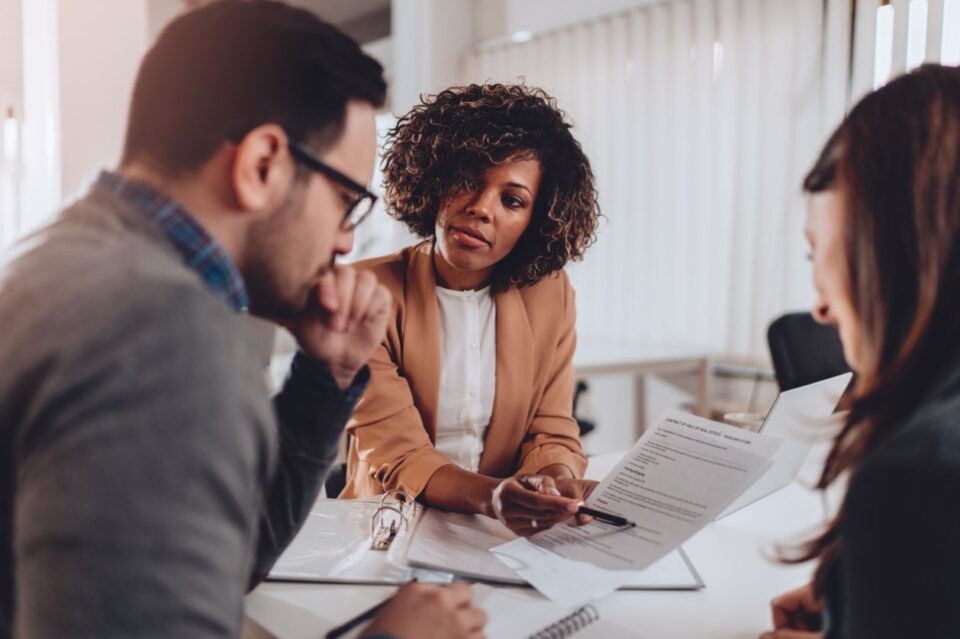 preparing to sign a contract of sale stock photo